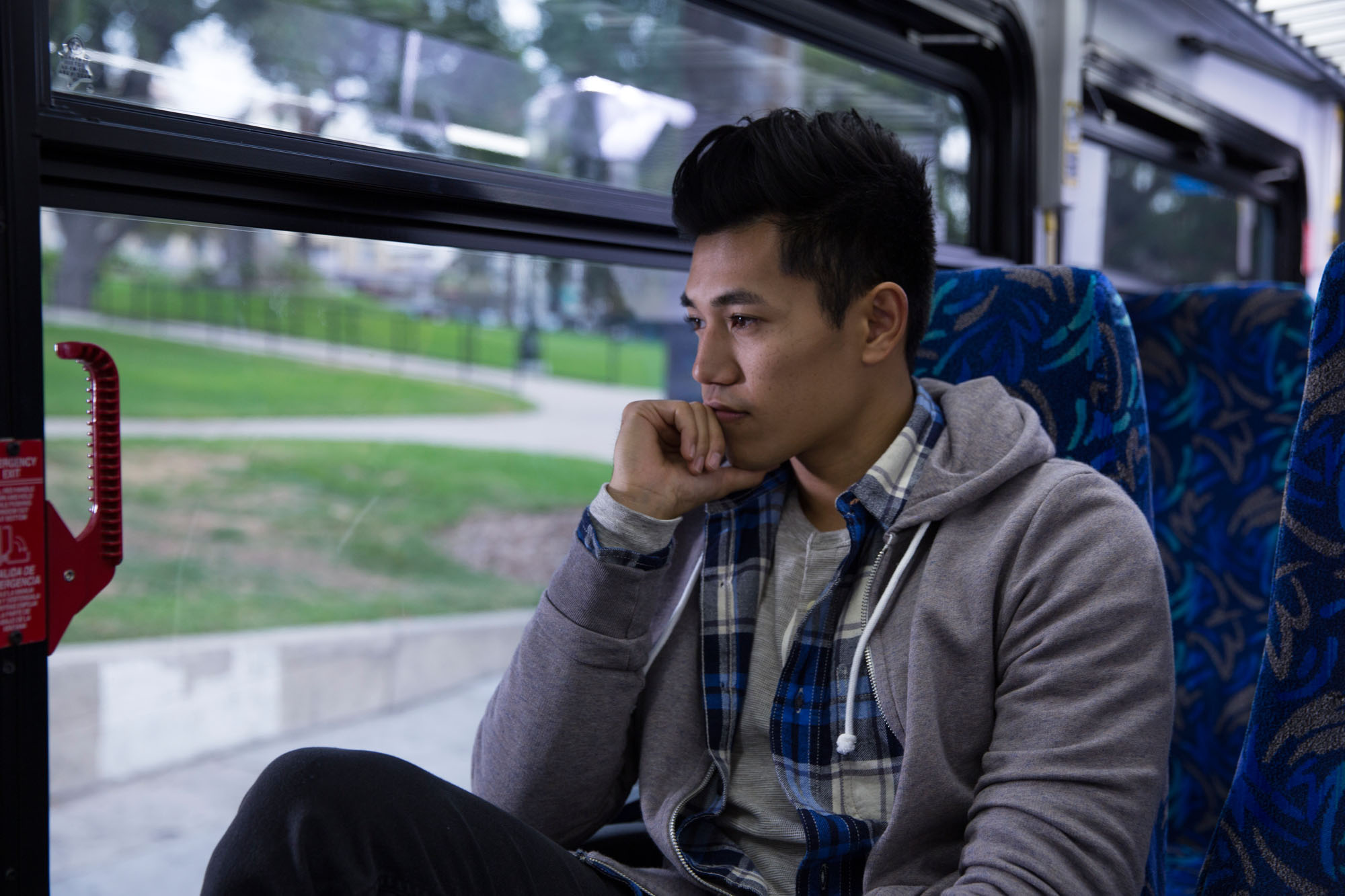 Looking out of bus window