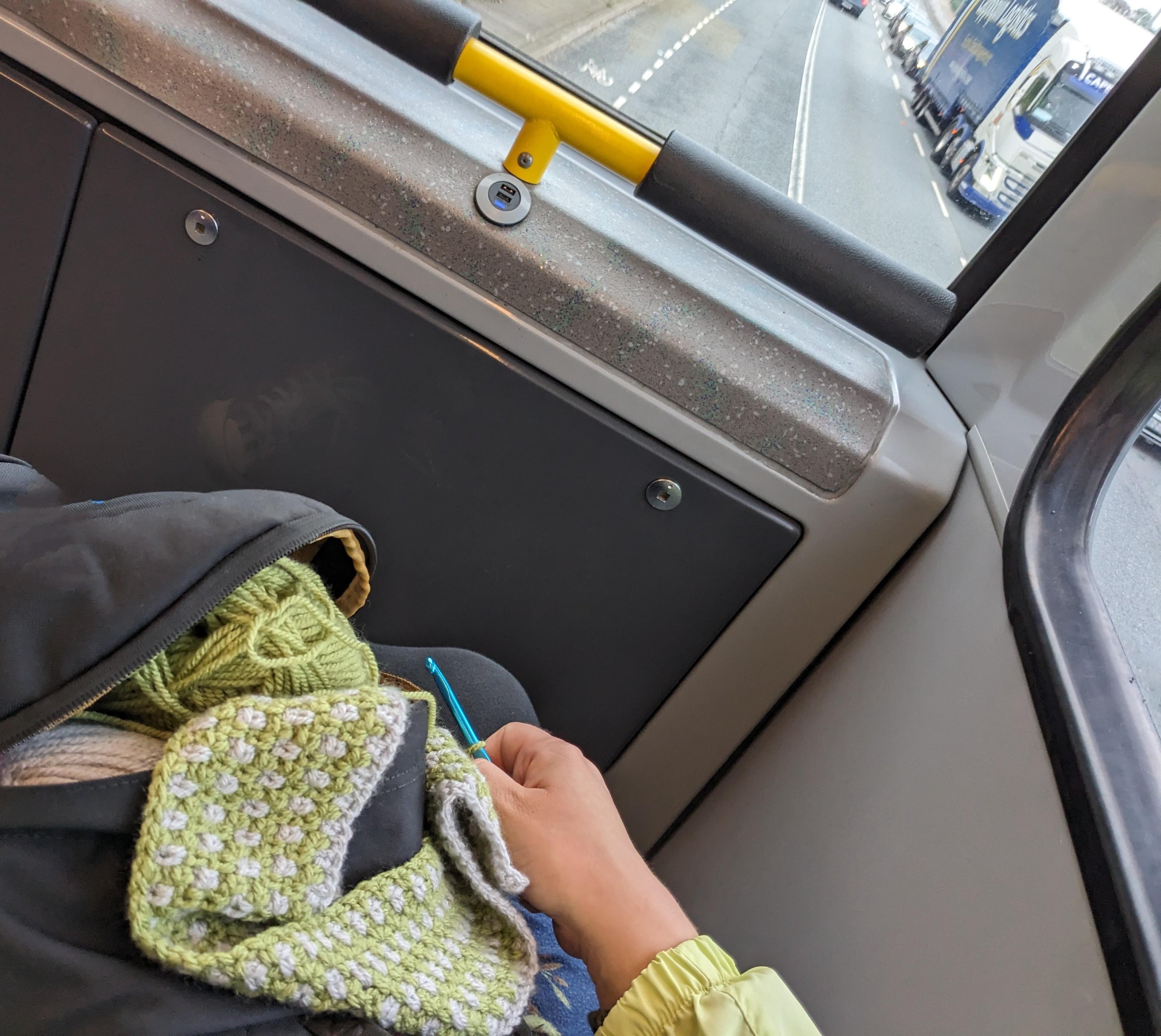 a crochet work in progress on a bus customer's lap -- from u/curiousdoodler on Reddit