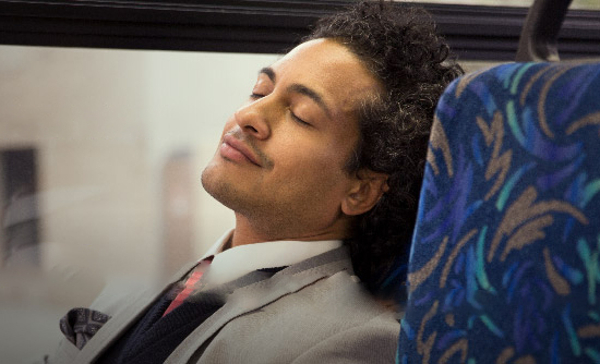 a customer sleeps on a bus