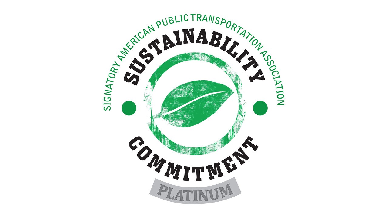 green leaf logo with the words "Signatory American Public Transportation Association Sustainability Commitment Platinum"