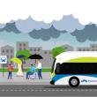 Peatones y un autobús en un día lluvioso