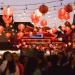 lanterns in Chinatown shine on a crowd celebrating Mid-Autumn Mood Festival
