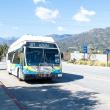 a Line 187 bus leaving Duarte with the foothills in the background