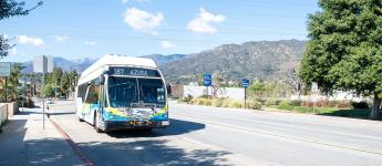 a Line 187 bus leaving Duarte with the foothills in the background