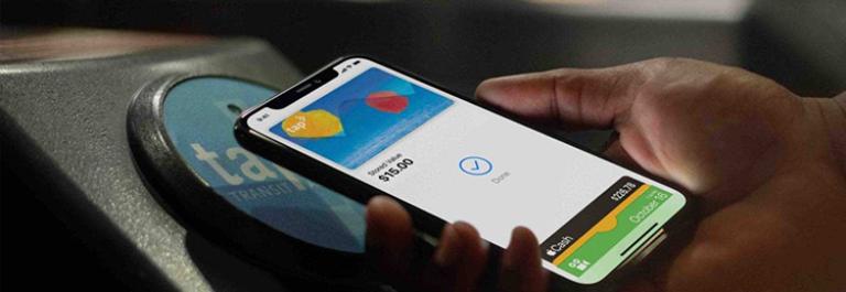 a customer taps their phone with the TAP LA app open against a fare validator